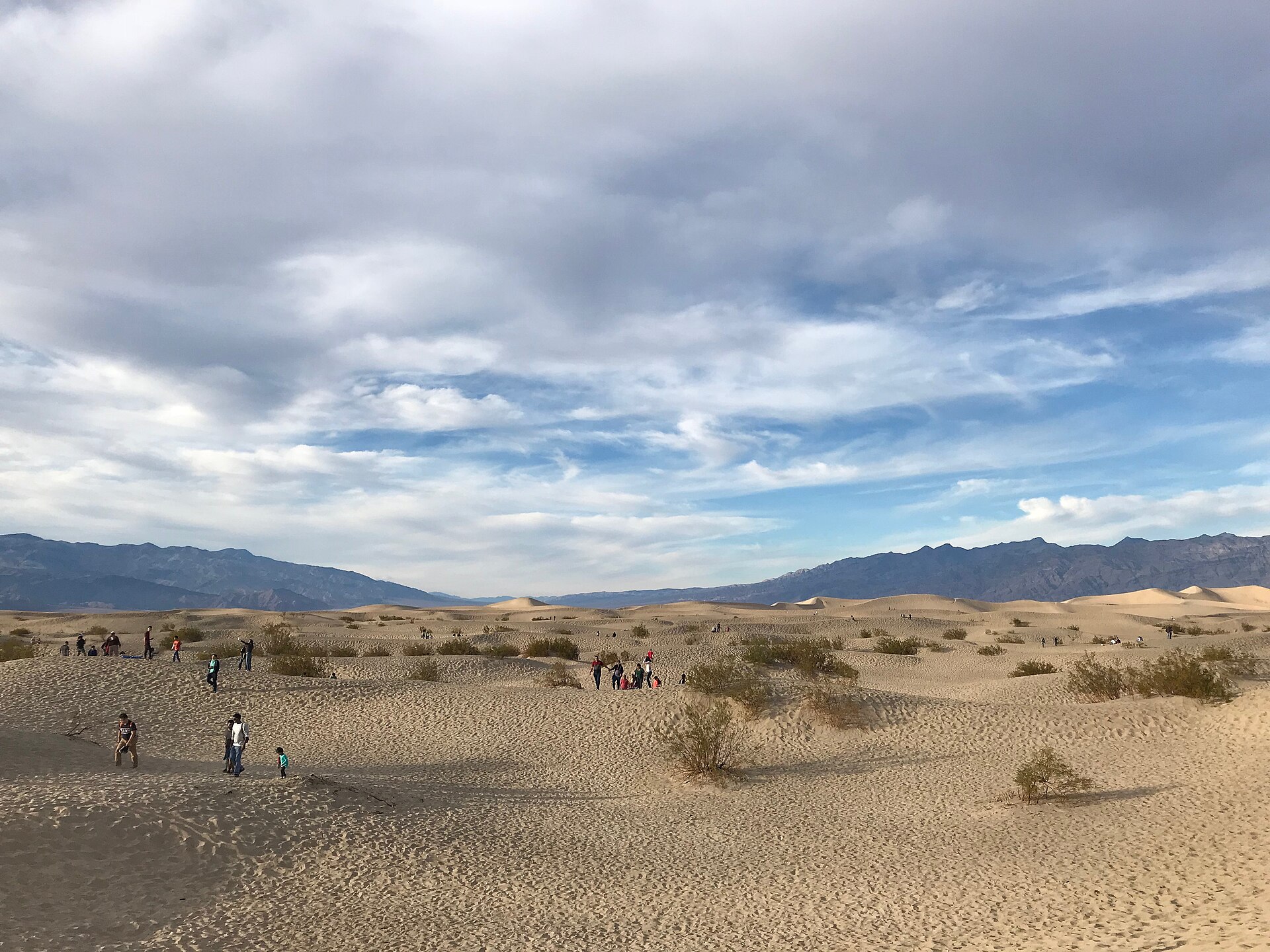 Sun-baked sand dunes under extreme heat